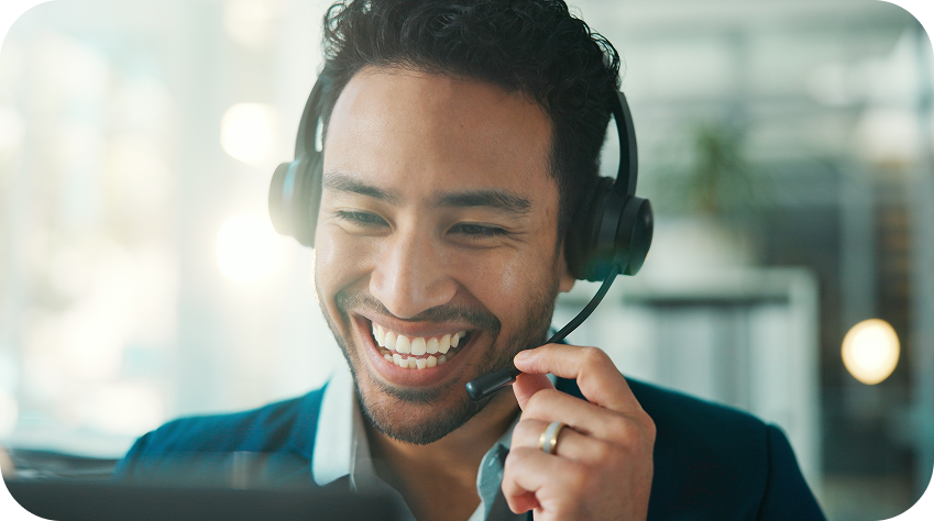 man wearing a headset smiling